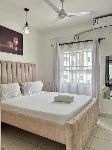 Katil atau katil-katil dalam bilik di Majestic Homes - Mombasa CBD