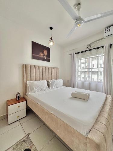 Katil atau katil-katil dalam bilik di Majestic Homes - Mombasa CBD