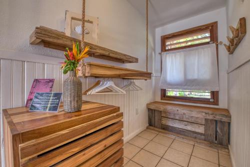 a room with a wooden counter with a vase on it at Camp Bay Lodge in Camp Bay