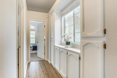 a hallway with a sink and a window at Family Home Near Folsom Lake in El Dorado Hills! in El Dorado Hills