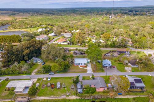 an aerial view of a small town with a park at Fishing Paradise Lake Poinsett Home with Deck! in Cocoa