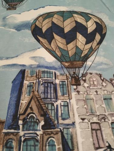 a painting of a hot air balloon over a building at COUNTRY HOUSE ViLLA GIGINA in San Gregorio