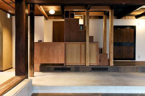 an empty courtroom with wooden cabinets in a building at kitan UOZU - Vacation STAY 18789 in Uozu