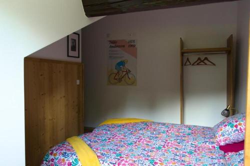 Katil atau katil-katil dalam bilik di Chambre d'hôte Odile et les cycleux Tillie
