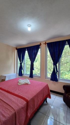Postel nebo postele na pokoji v ubytování Casa Roca