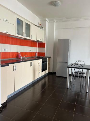 Kuchyň nebo kuchyňský kout v ubytování Bella Home Apartment