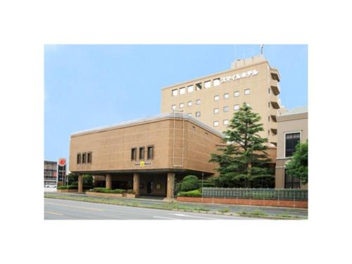 a large building on the side of a street at Smile Hotel Yonago - Vacation STAY 61072v in Yonago