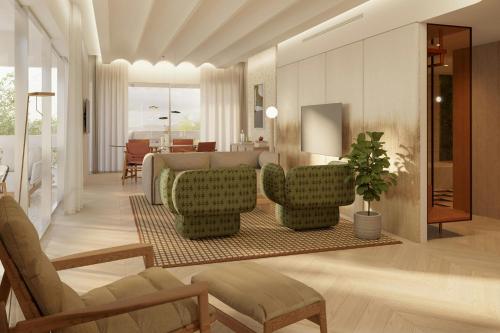 a living room with two chairs and a couch at The Landmark Nicosia, Autograph Collection in Nicosia