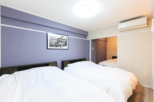 Postel nebo postele na pokoji v ubytování Yamani Building, Room 203 - Vacation STAY 62026v