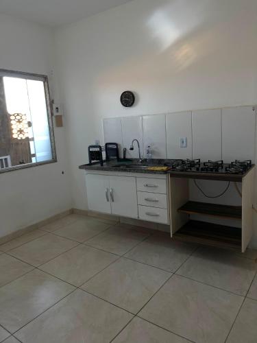 Η κουζίνα ή μικρή κουζίνα στο Loft Cantinho do Amor