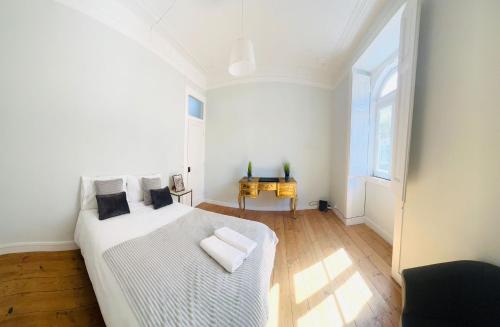Ένα ή περισσότερα κρεβάτια σε δωμάτιο στο Luxury flat Sintra, next attractions