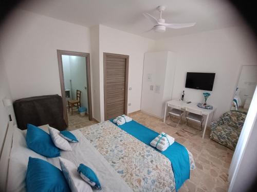 Кровать или кровати в номере La Maison