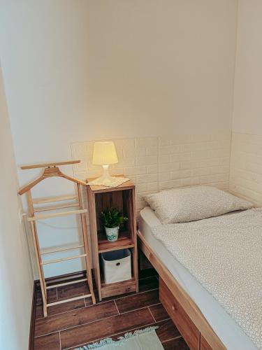 Ένα ή περισσότερα κρεβάτια σε δωμάτιο στο Apartments Ivanović