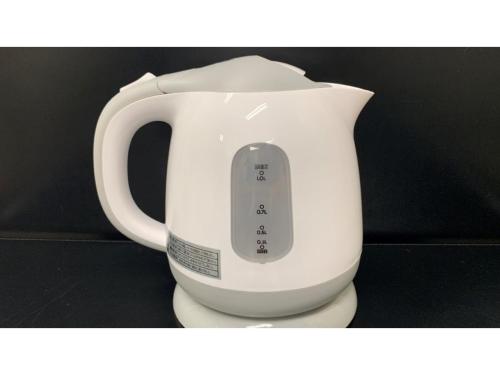 a white jug with a remote control in it at Smile Hotel Nagoya Sakae - Vacation STAY 66704v in Nagoya
