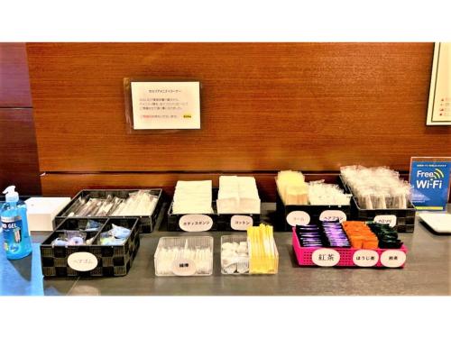 a counter with alot of different types of food at Smile Hotel Nagoya Sakae - Vacation STAY 66752v in Nagoya