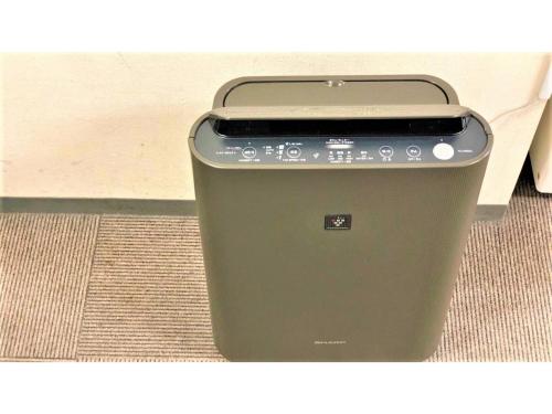 a black trash can sitting on the floor at Smile Hotel Nagoya Sakae - Vacation STAY 66752v in Nagoya
