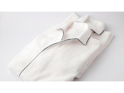 a white sweater with a tie on a white background at Smile Hotel Tokyo Nishikasai - Vacation STAY 67965v in Tokyo