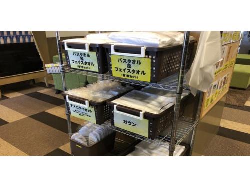 a shelf filled with lots of boxes in a store at Smile Hotel Tomakomai - Vacation STAY 68911v in Tomakomai