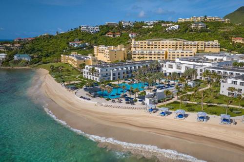 an aerial view of a resort on the beach at JW Marriott St Maarten Beach Resort & Spa in Dawn Beach