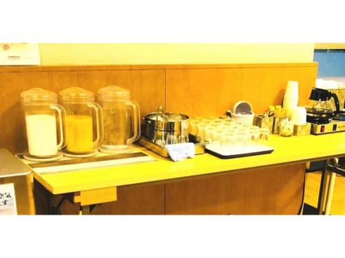 a counter with jars and other items on it at Smile Hotel Tomakomai - Vacation STAY 68943v in Tomakomai