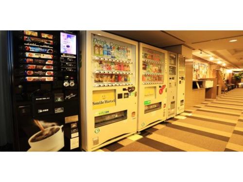 a row of vending machines in a grocery store at Smile Hotel Tomakomai - Vacation STAY 68943v in Tomakomai