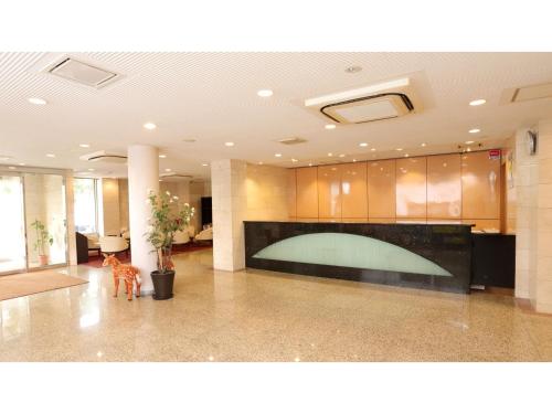 a lobby with a large screen in a building at Smile Hotel Nara - Vacation STAY 73673v in Nara