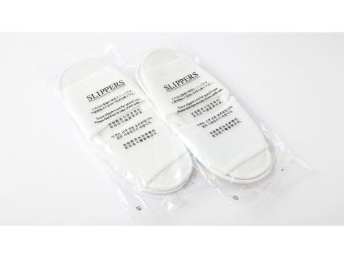 two white toothbrushes sitting in a plastic container at Smile Hotel Shonan Fujisawa - Vacation STAY 74510v in Fujisawa