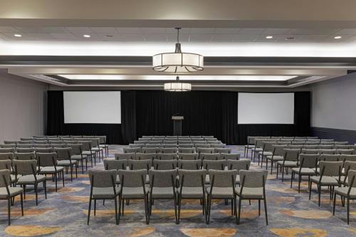 a lecture hall with rows of chairs and whiteboards at Sheraton Boston Hotel in Boston