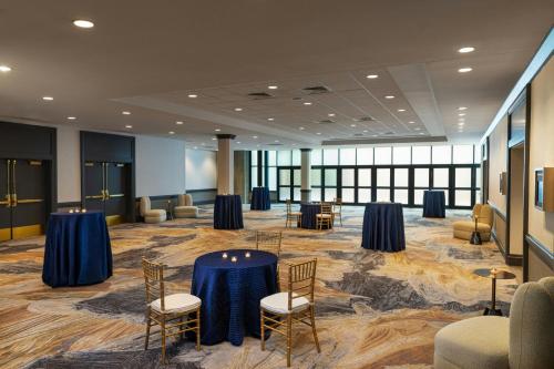 a conference room with tables and chairs in a building at Sheraton Boston Hotel in Boston
