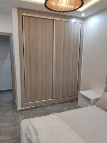 Ένα ή περισσότερα κρεβάτια σε δωμάτιο στο Appartement calme