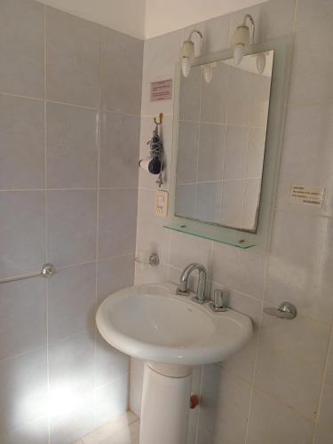 a bathroom with a sink and a mirror at Mafalda in Tanti