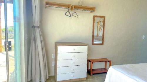 Postel nebo postele na pokoji v ubytování Studio Zen - Hidromassagem -Vista Mar-Area Gourmet
