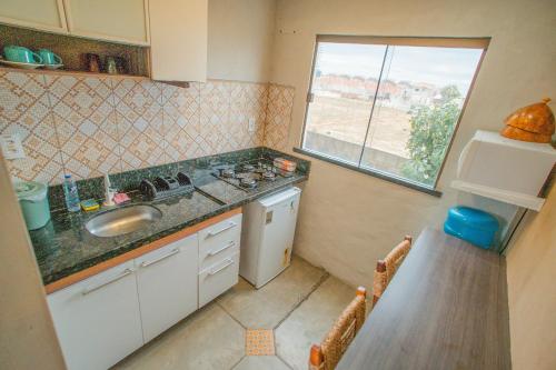 Kuchyň nebo kuchyňský kout v ubytování Studio Zen - Hidromassagem -Vista Mar-Area Gourmet