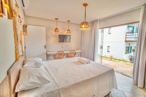 Postel nebo postele na pokoji v ubytování Studio Zen - Hidromassagem -Vista Mar-Area Gourmet