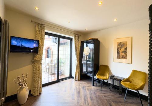 TV a/nebo společenská místnost v ubytování Balancyoga Guesthouse