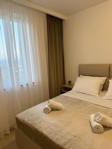 Ένα ή περισσότερα κρεβάτια σε δωμάτιο στο View Apartments Međugorje