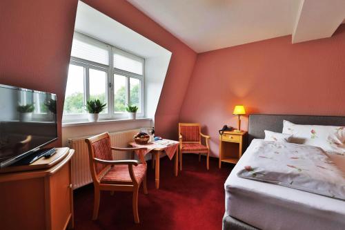 Posezení v ubytování Hammermühle Hotel & Gesundheitsresort