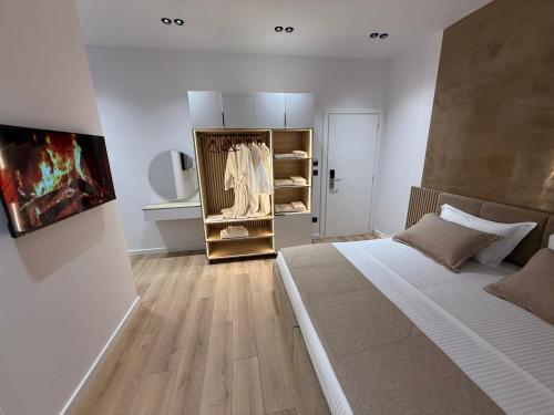 Postel nebo postele na pokoji v ubytování Montflux Hotel