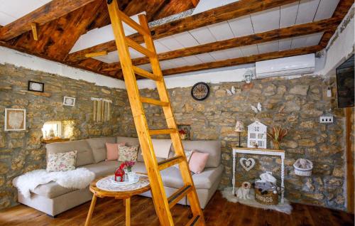 Katil atau katil-katil dalam bilik di Amazing Home In Puljane