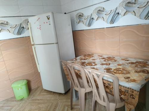 Kuchyň nebo kuchyňský kout v ubytování Nabil appartement