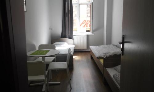 מיטה או מיטות בחדר ב-Hostel Imbir