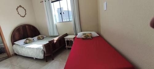 Postel nebo postele na pokoji v ubytování Pousada Apucarana - Sede