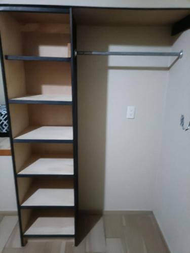 a refrigerator with its door open in a room at Excelente Ubicacion in Zamora de Hidalgo