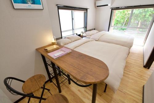 a living room with a couch and a table at Amesoko 747 in Amesoko