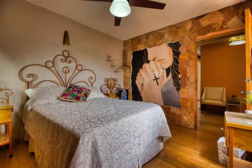 Ένα ή περισσότερα κρεβάτια σε δωμάτιο στο Hotel Boutique Josefas