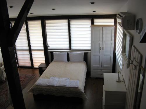 Säng eller sängar i ett rum på Kapana Plovdiv