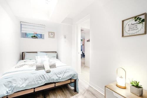 Postel nebo postele na pokoji v ubytování Cocon central pour deux voyageurs