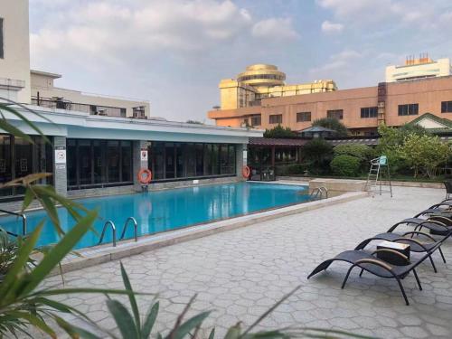Πισίνα στο ή κοντά στο Zhongshan International Hotel