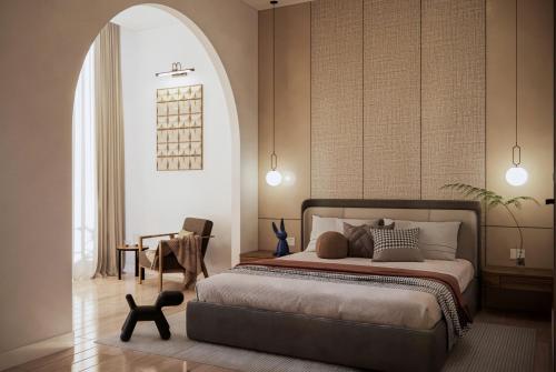 Giường trong phòng chung tại Petit Hotel