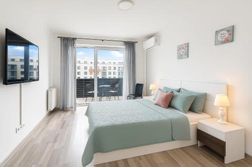 Ένα ή περισσότερα κρεβάτια σε δωμάτιο στο Ada Homes B69